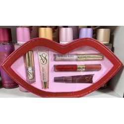 Set de regalo de 5 piezas de Victoria's Secret: brillo labial, aceite, mascarilla y voluminizador de labios.